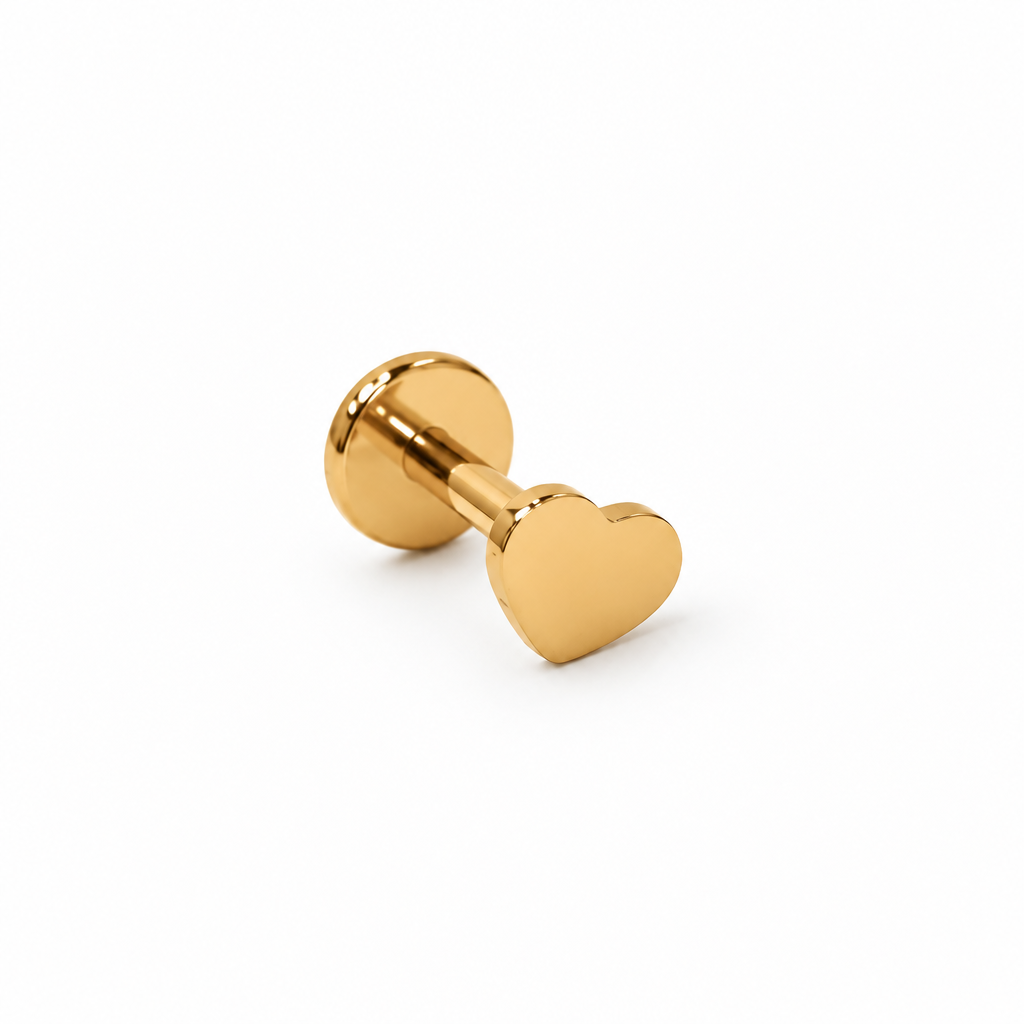 Gold-tone heart flat-back stud on a white studio background