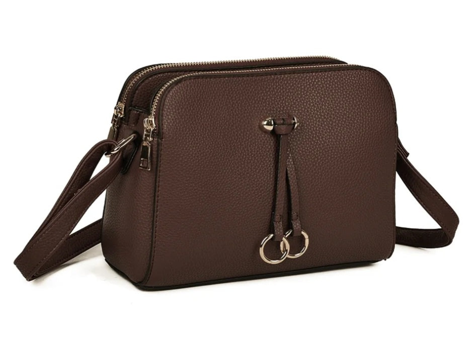 Brown crossbody bag with double zip and ring charms