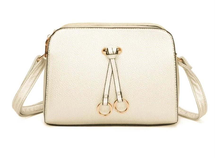 Teal crossbody bag with double zip and ring charms