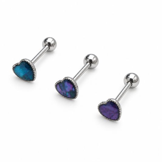 Three stainless steel tongue bars with dark iridescent heart fronts and polished ball ends, shown for display; sold individually